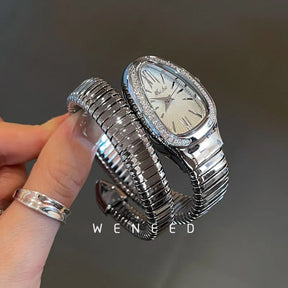 Relógio Feminino Luxo Serpente Dourado – Pulseira Espiral com Cristais e Movimento Quartzo